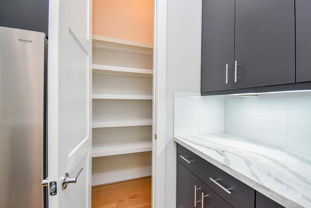 The walk-in pantry is perfect for additional storage.