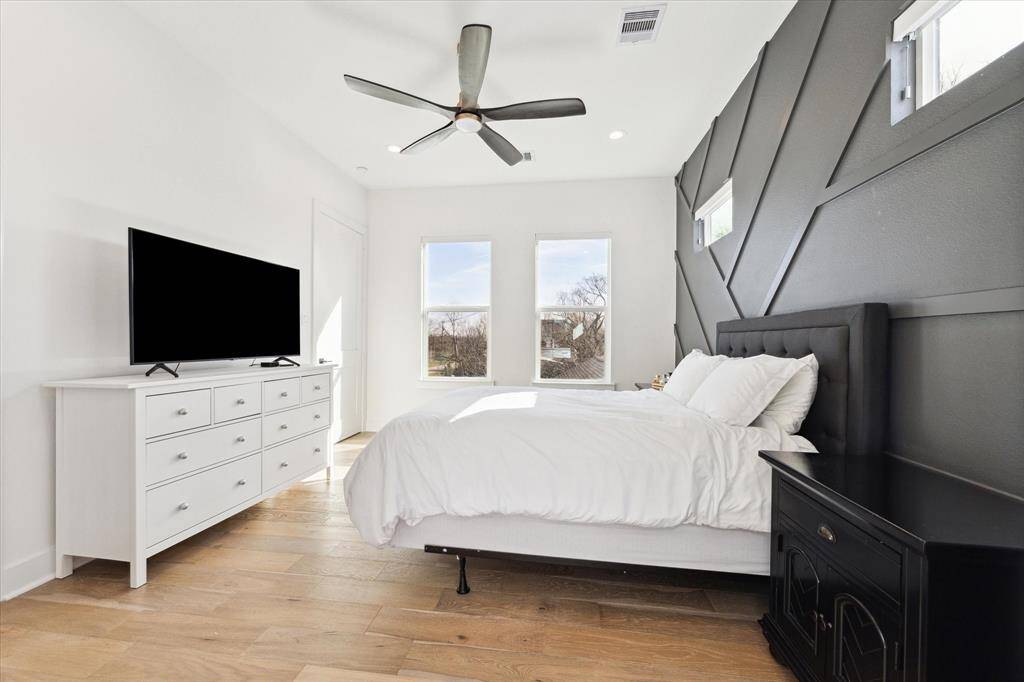 Another view of the primary bedroom.