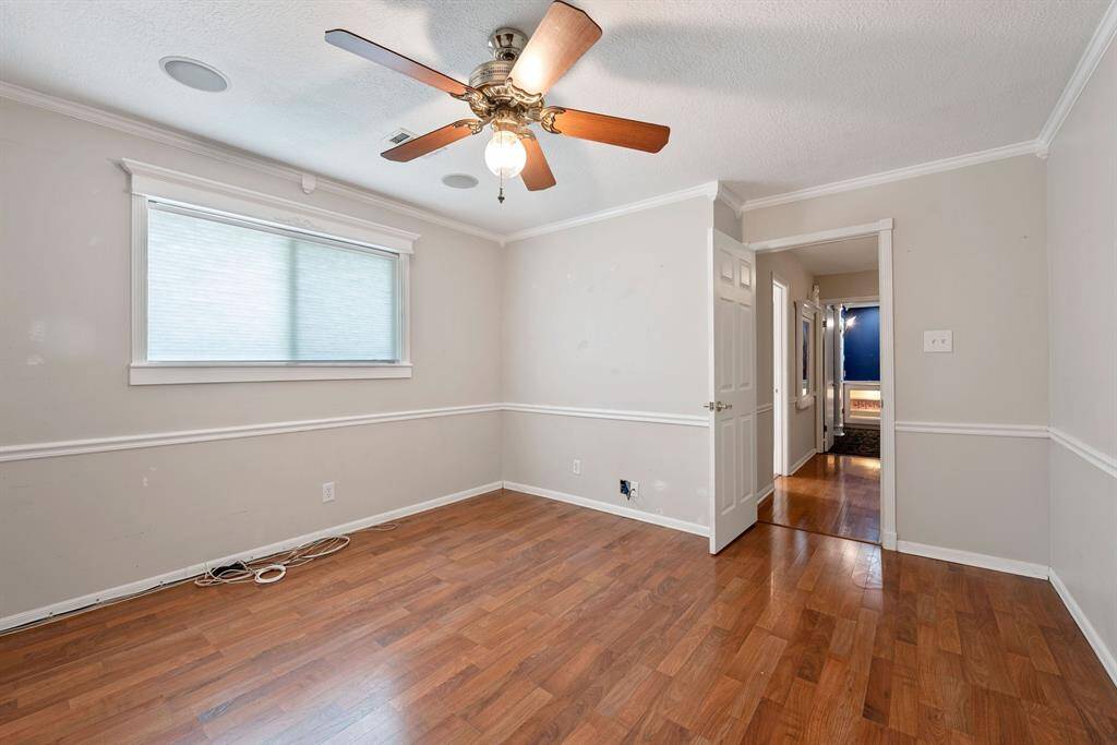The wood floors continue throughout the bedrooms.