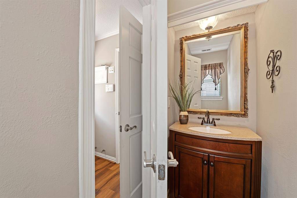 Half bath off utility room so that you can easily run in from the back yard.