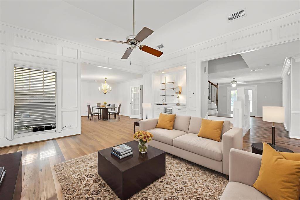 Imagine the living and dining rooms, through this virtually staged photo, with your furniture in them.