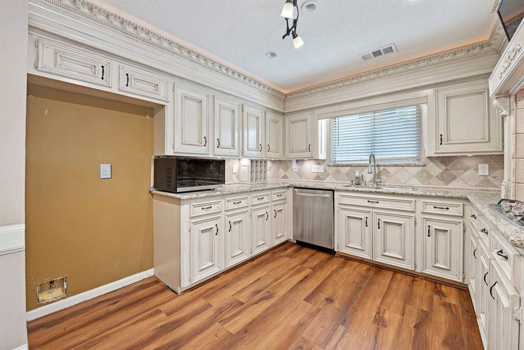 The gourmet chef will love all of the counter space and cabinets.