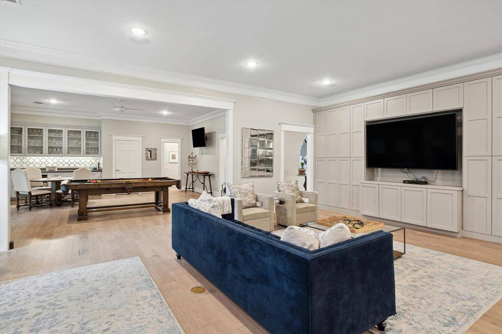 Another view of the LIVING ROOM open to the GAMEROOM.