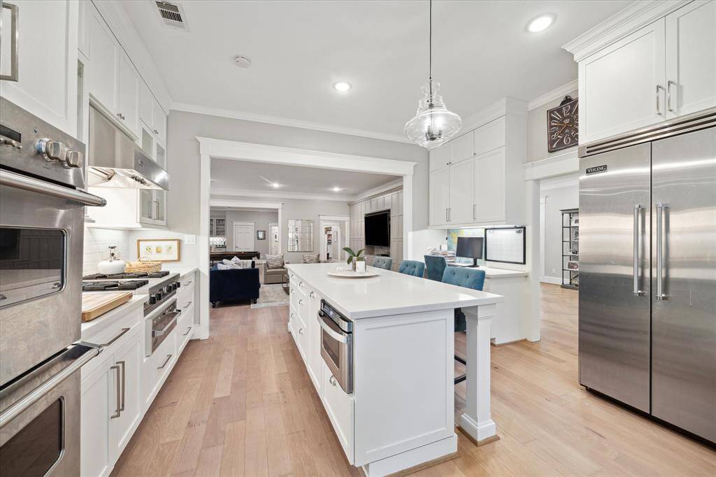 The renovated gourmet KITCHEN offers top of the line Viking appliances, gas cooktop, double ovens and a warming drawer just to name a few of the many features.
