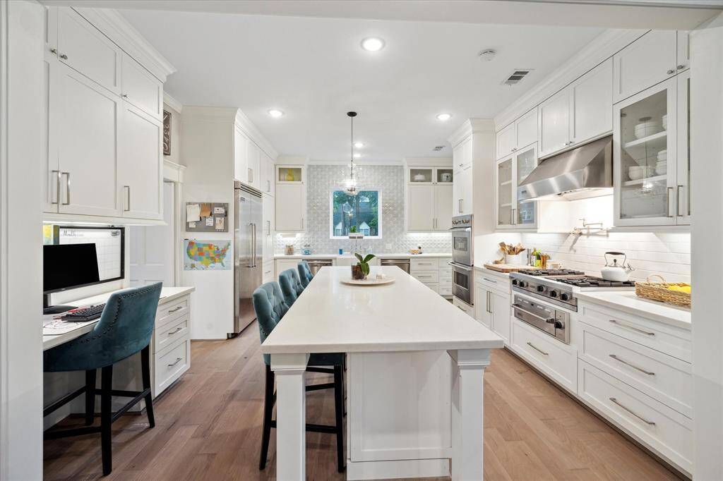 Another view of the KITCHEN with endless cabinet space for extra storage.