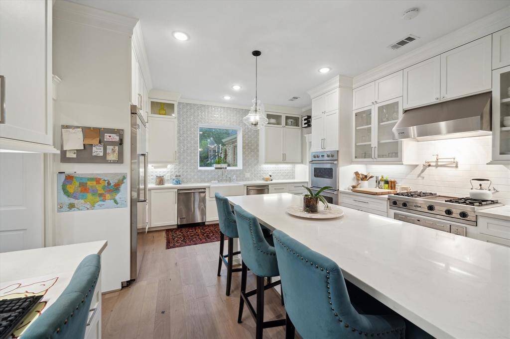 The expansive center island is most convenient for both prep work and additional seating when entertaining.