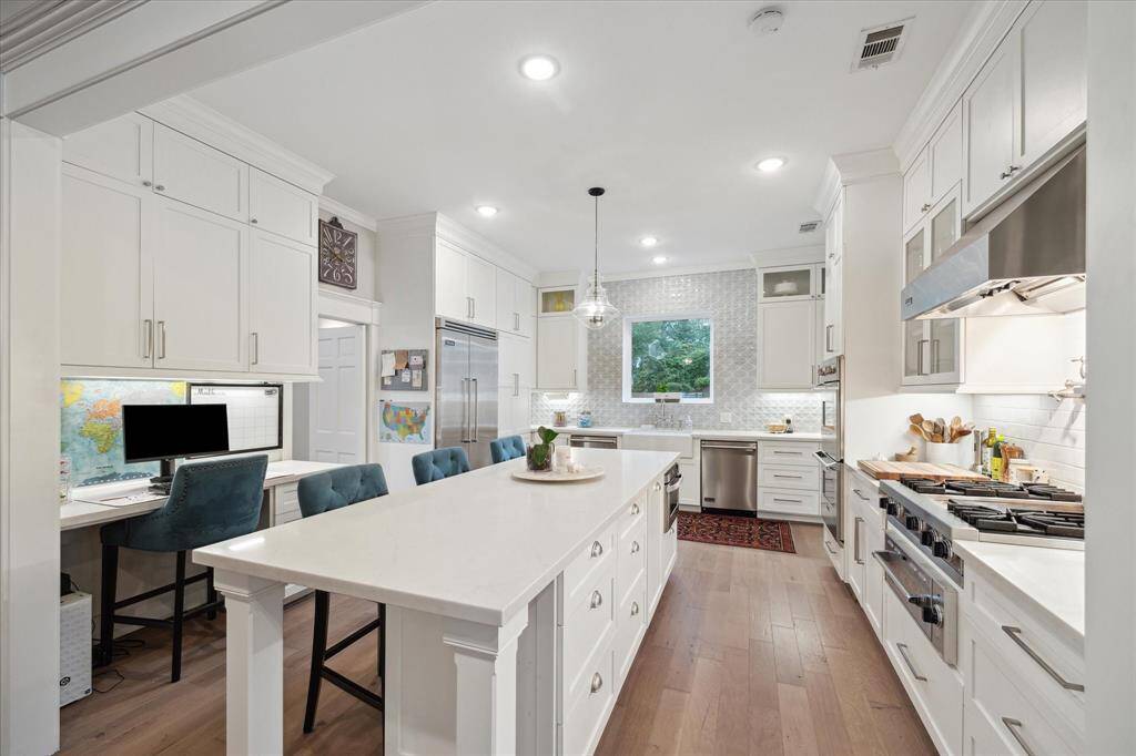 Another view of the KITCHEN shows the convenient built -in desk area.