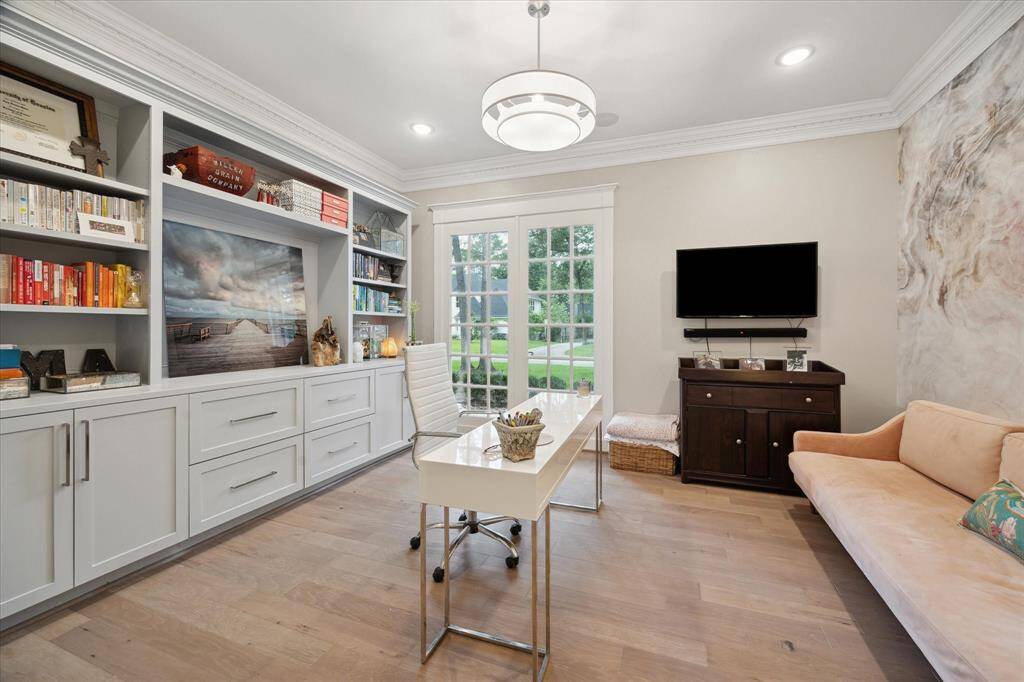HOME OFFICE / STUDY - the second study is more whimsical with a designer accent wall and overlooks the front yard.