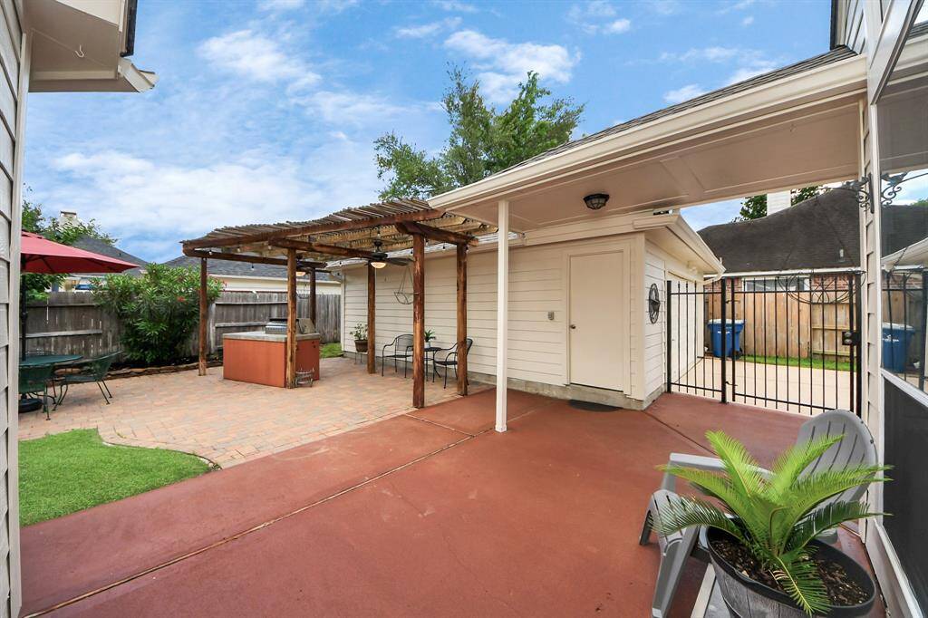 The extended patio offers ample room for outdoor living and dining. Additionally, enjoy the outdoor kitchen for the ultimate escape.