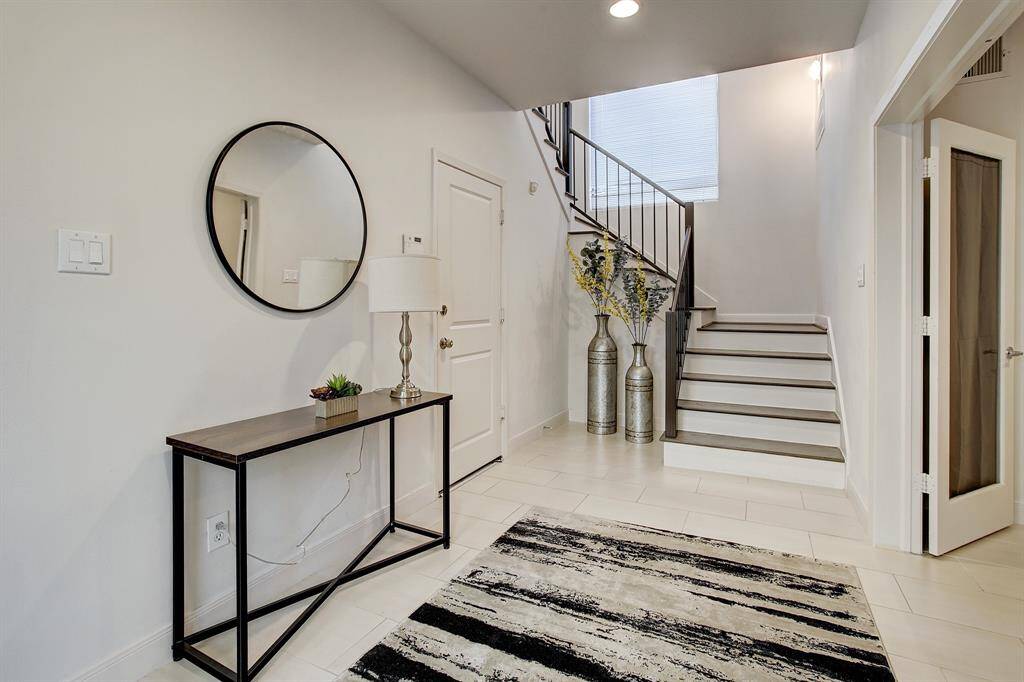 Front door entrance as well as entrance from 2 car attached garage
