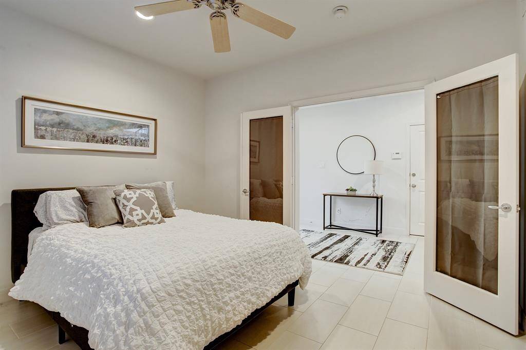 Beautiful French doors open to nice sized downstairs bedroom