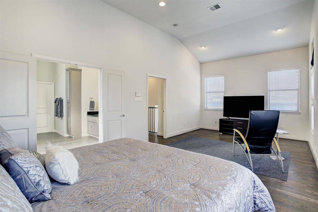 Watch TV from bed or relax in the chair in the sitting area