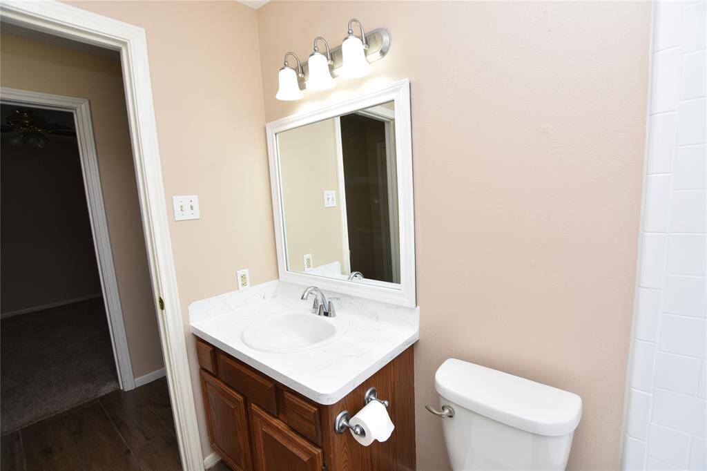 Whether hosting overnight guests or providing a convenient space for family members, this guest bathroom offers a welcoming and functional environment that meets a variety of needs.