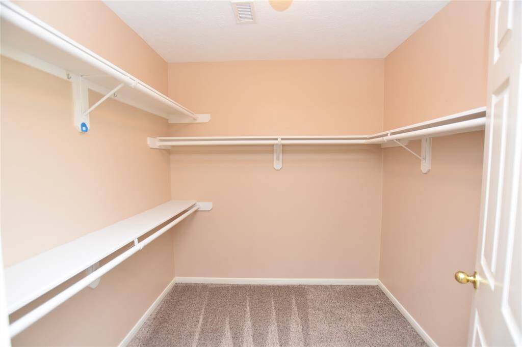 Embrace the luxury of space with these "Texas-sized" closets, thoughtfully designed to accommodate extensive wardrobes and accessories.