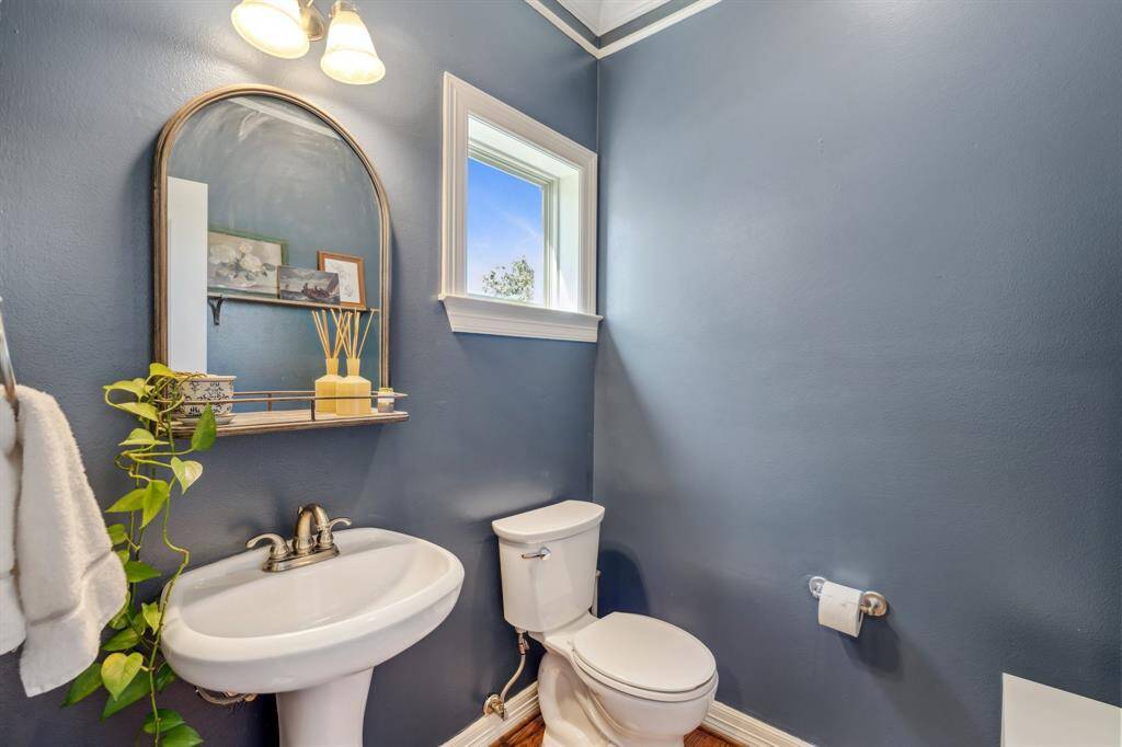 A half bathroom for convenient guest use.