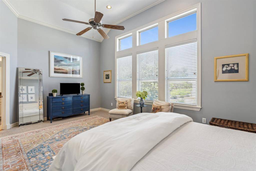 Soaring ceilings and large windows allow the natural light to fill the room.