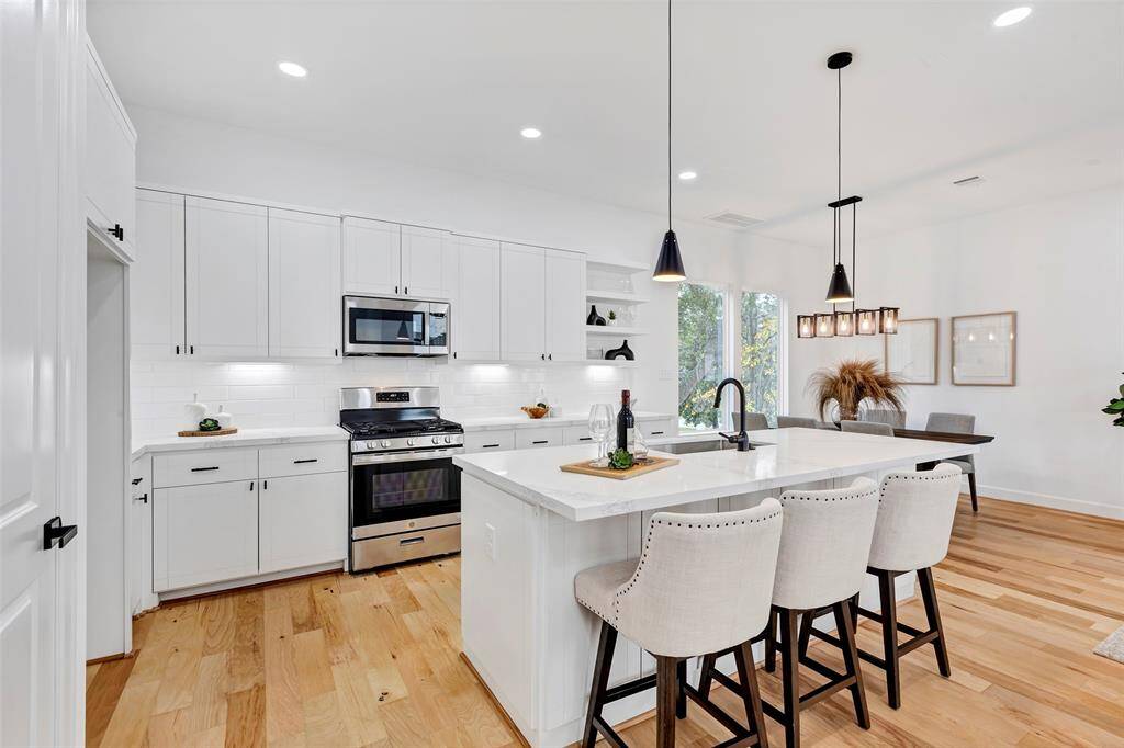The kitchen provides ample storage space and counter space.