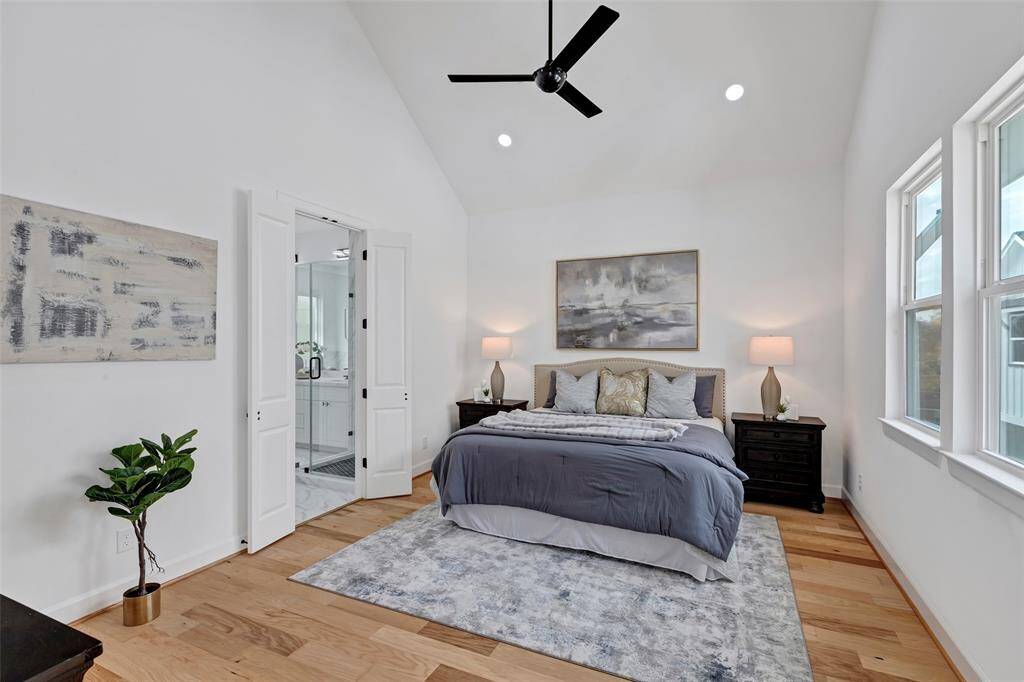 The primary suite features vaulted ceilings, natural light, and plenty of space to relax after a long day.  (Model Unit 9424C)