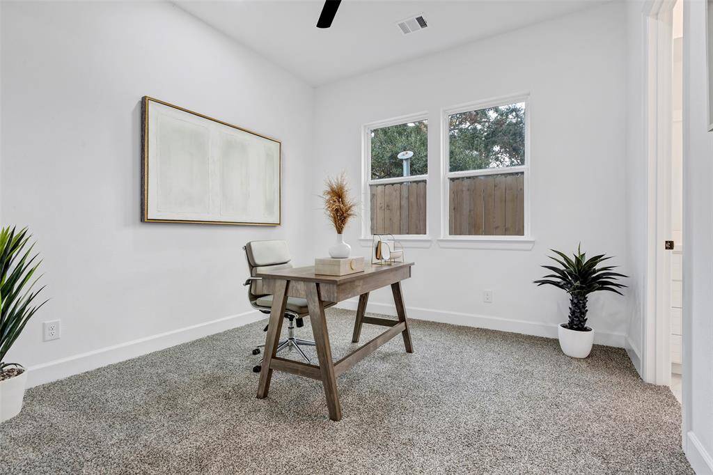 The first floor bedroom can be used as a guest room, or perhaps a home office! (Model Unit 9424C)