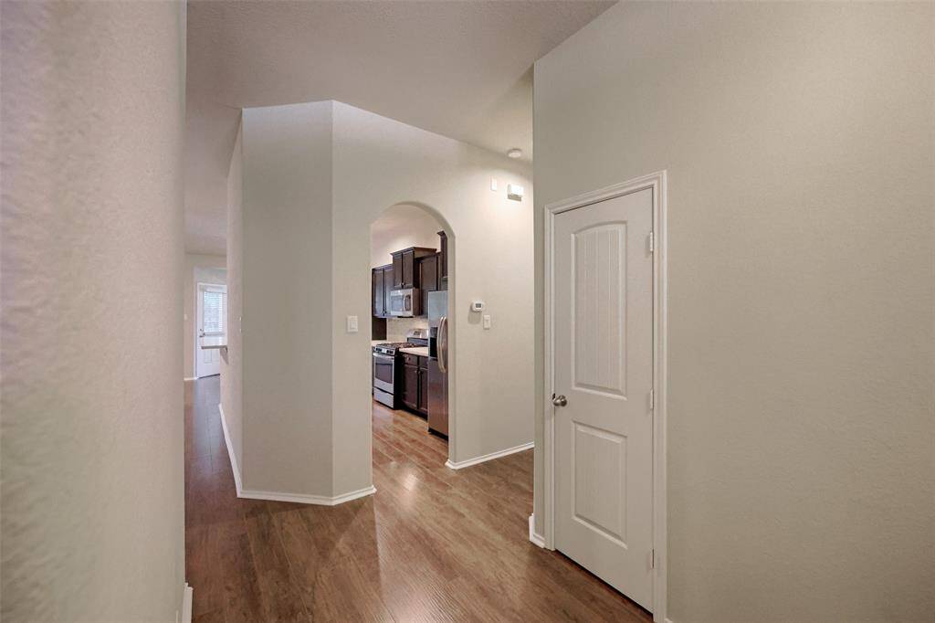Coat closet in the entry is convenient for storage.