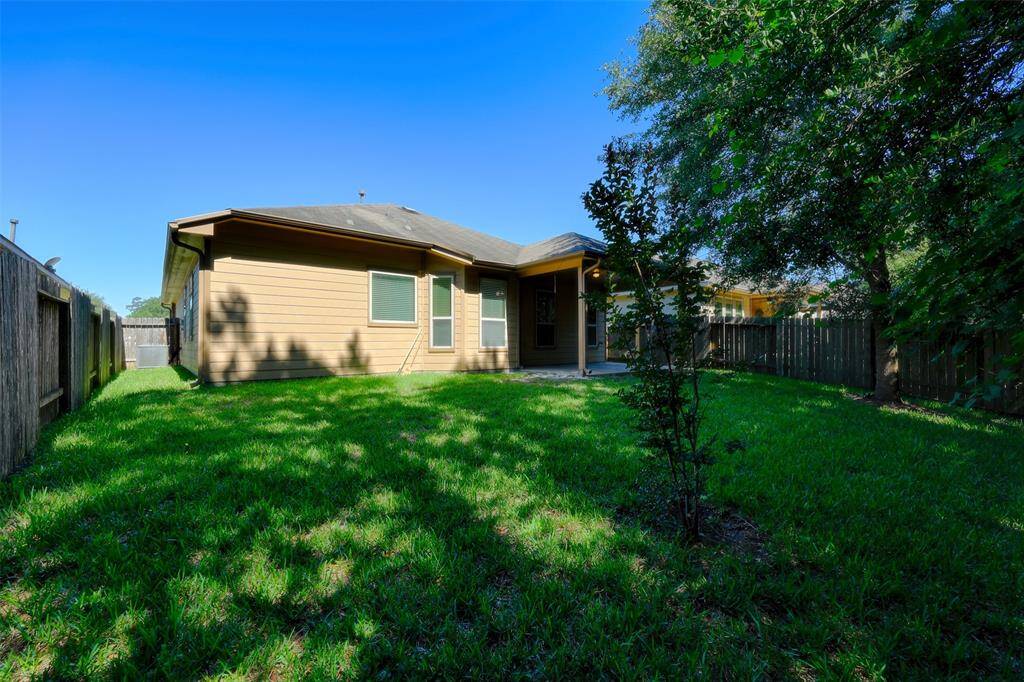 A nice shaded yard with mature trees is perfect for pets or yard games!
