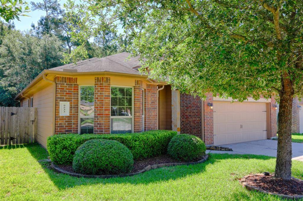 Nicely landscaped front is welcoming and easy to care for.