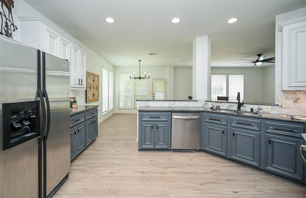 Step into this modern kitchen, wherefunctionality meets sophistication.
