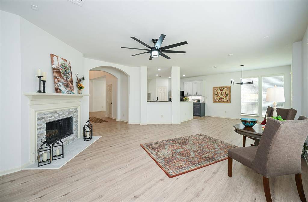 At the heart of the space, a fireplaceadds a cozy focal point, providingwarmth and charm.