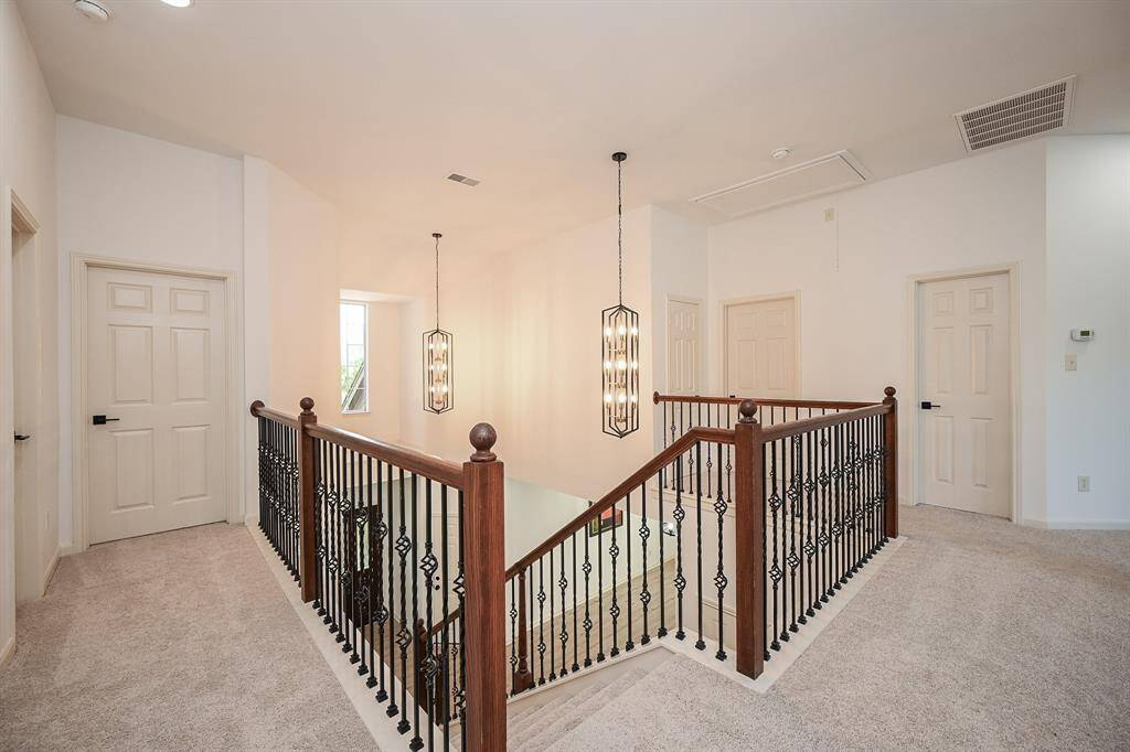 Right upstairs are the secondary bedrooms and game room!