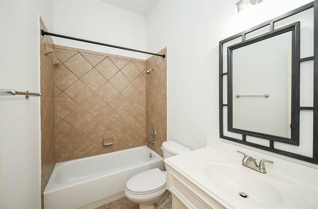 Secondary bathroom features atub/shower combo and vanitywith plenty of counter space.