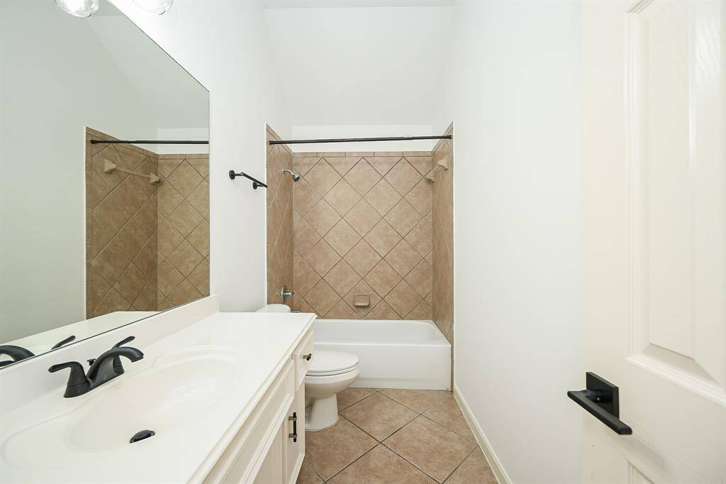 Third bathroom features atub/shower combo and vanitywith plenty of counter space.