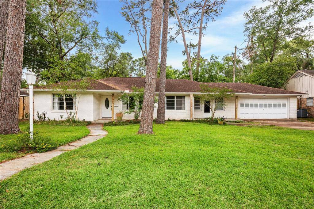WELCOME to 9741 Warwana, a classic, brick Houston ranch home with nature on the doorstep yet minutes away from amenities.