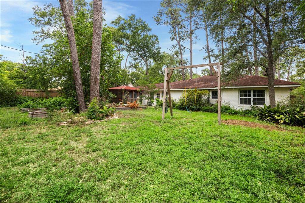 BACKYARD. So much potential.   The current owners grew their own herbs, vegetables and kept chickens.  Yet still room for a screened porch and swing set.