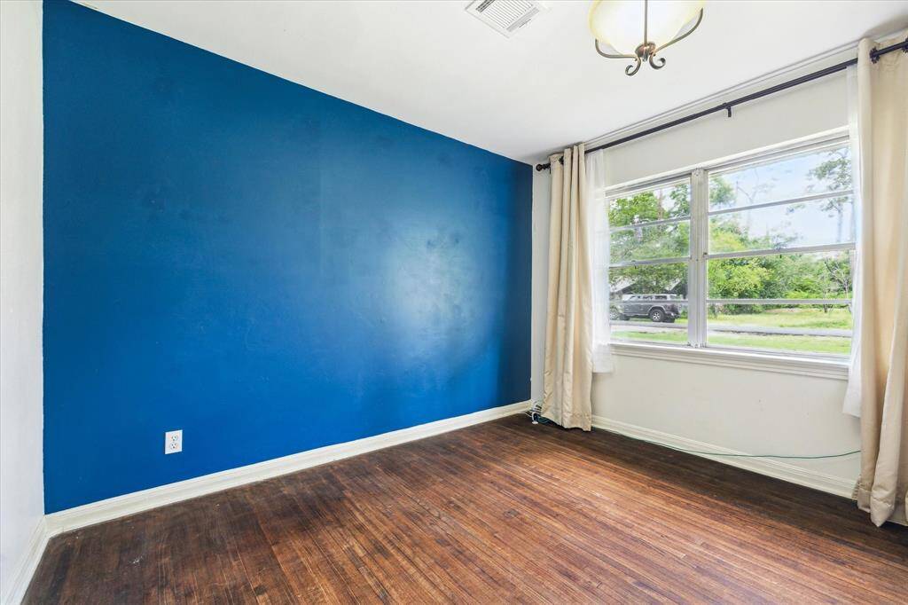 PLAY SPACE. Located at the kitchen end of the living room, the current owners used this space as a small play area. The living room is long so can easily accommodate this dual use.