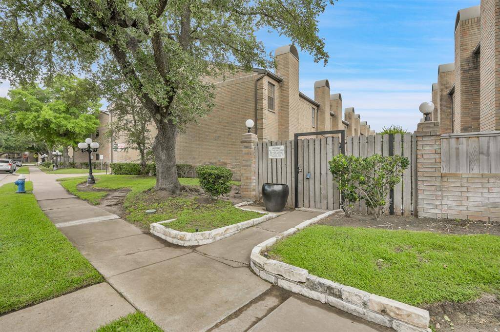 Gated Townhome with lots of green space Gated Entrance