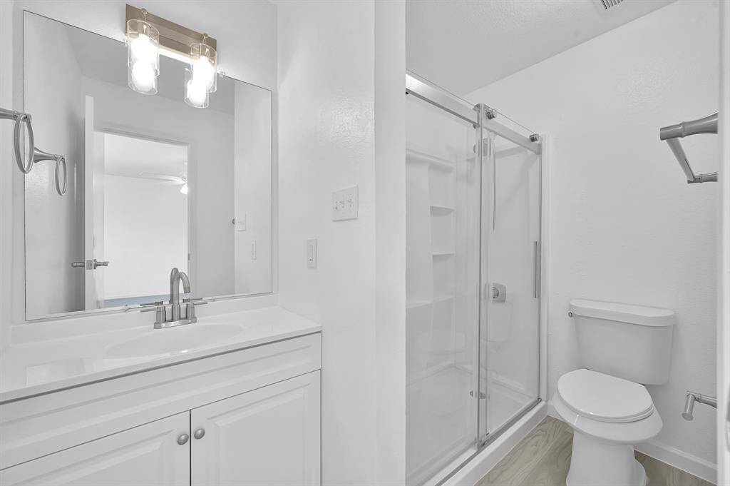 Secondary bathroom walk in shower new renovated.