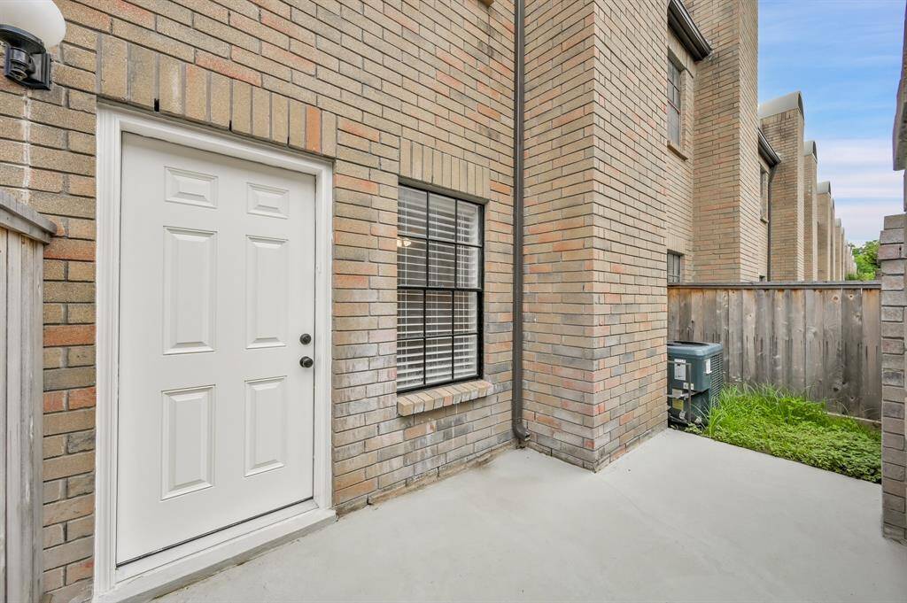 Private Fenced area with space for plants, siting, and green space for pets.