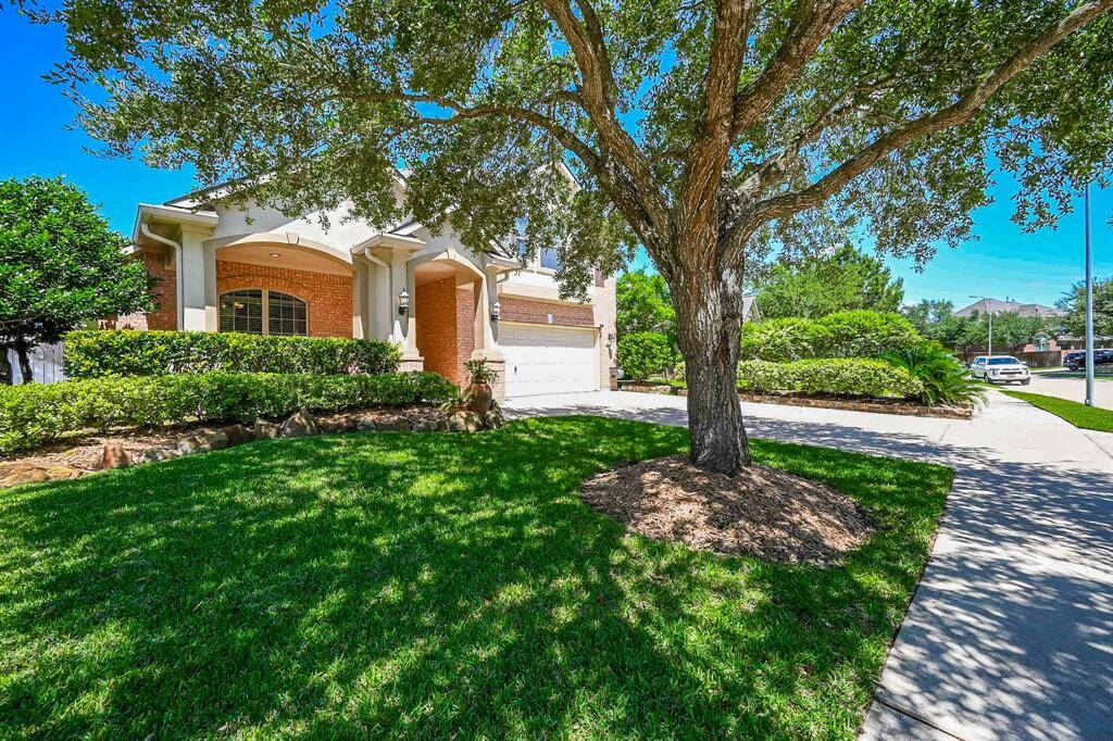 Blue skies and lush native greenery welcome you to this gorgeous 2007 2-story brick/stucco home at 10023 Terrance Springs Lane, Katy, TX, in the Cinco Southwest Community. Featured, are 4 bedrooms and 3-1/2 baths, all gracing a generous 9,095 square-foot lot with 2,812 square-feet of interior space.