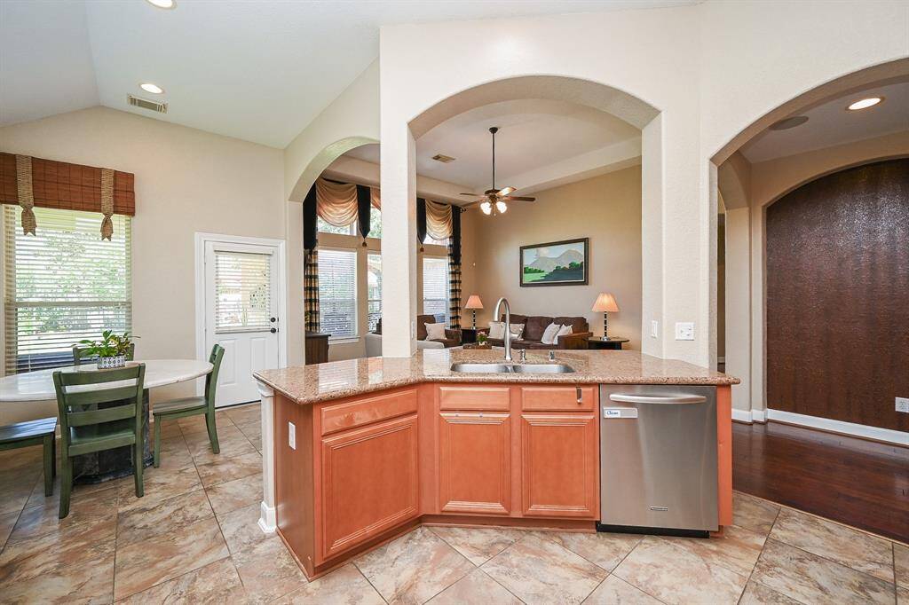 Create culinary magic and still socialize in this dellghtfully open, airy kitchen.
