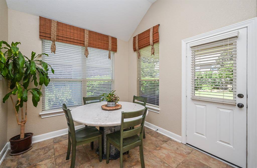This cozy breakfast/casual dining nook is bound to become family central, for weekday meals; with natural light, galore.
