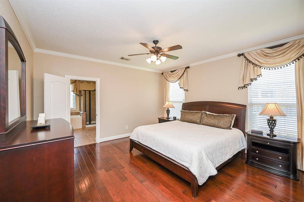 Your primary ensuite bath peeks out, up left.