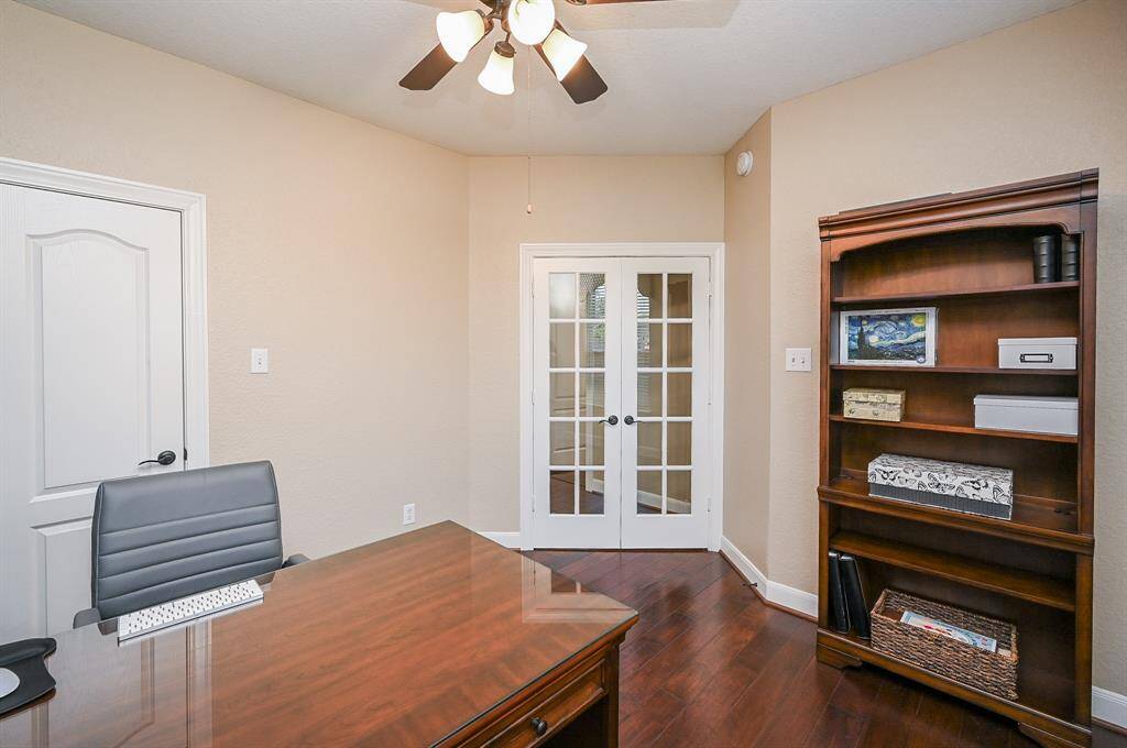 Classic french doors make this special front room as accessible or private as you wish.