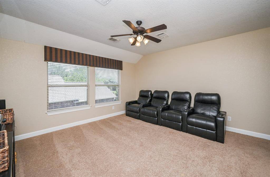 Exceptional carpeted space on the 2nd 'game room' floor serves as a durable canvas for your chosen activities, up here.