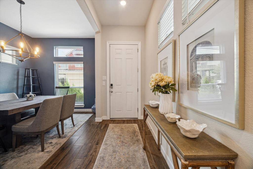 Step inside to a spacious entryway and a versatile formal dining room—could also be a perfect den or home office. One of the few homes in the neighborhood offering this flexible bonus space!