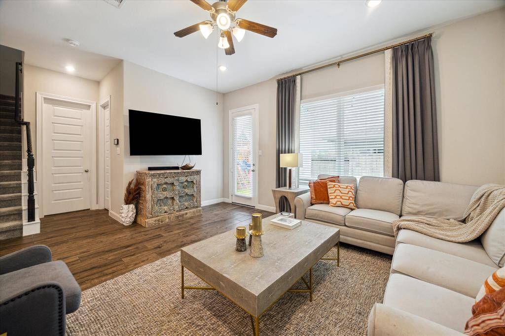 A view from the light and bright family room. Before we head upstairs, let's check out the downstairs guest bedroom.