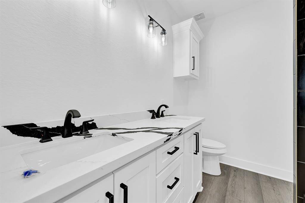 Dual vanity in primary bathroom
