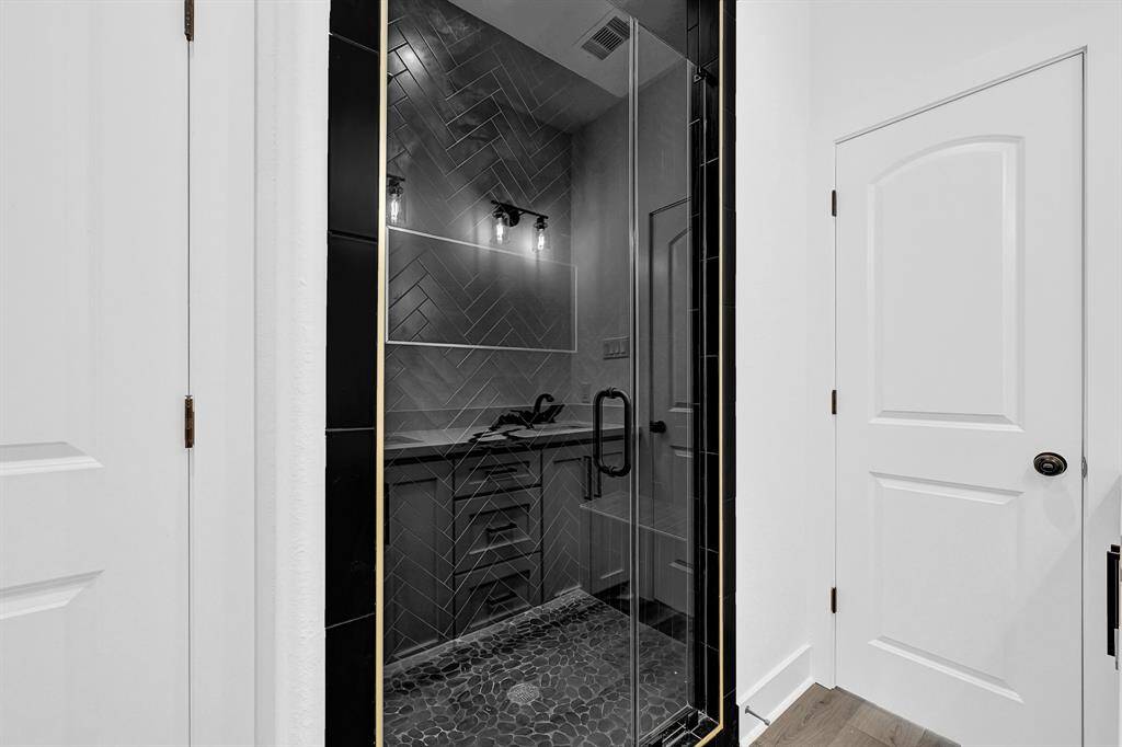 Walk in shower in with exquisite finishes