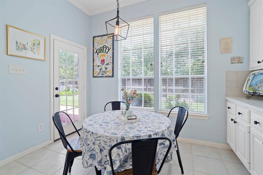 The breakfast room features awindow with views in your backyardnext to the back door.