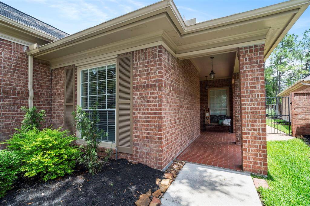The covered front porch has plenty of space for a sitting area.