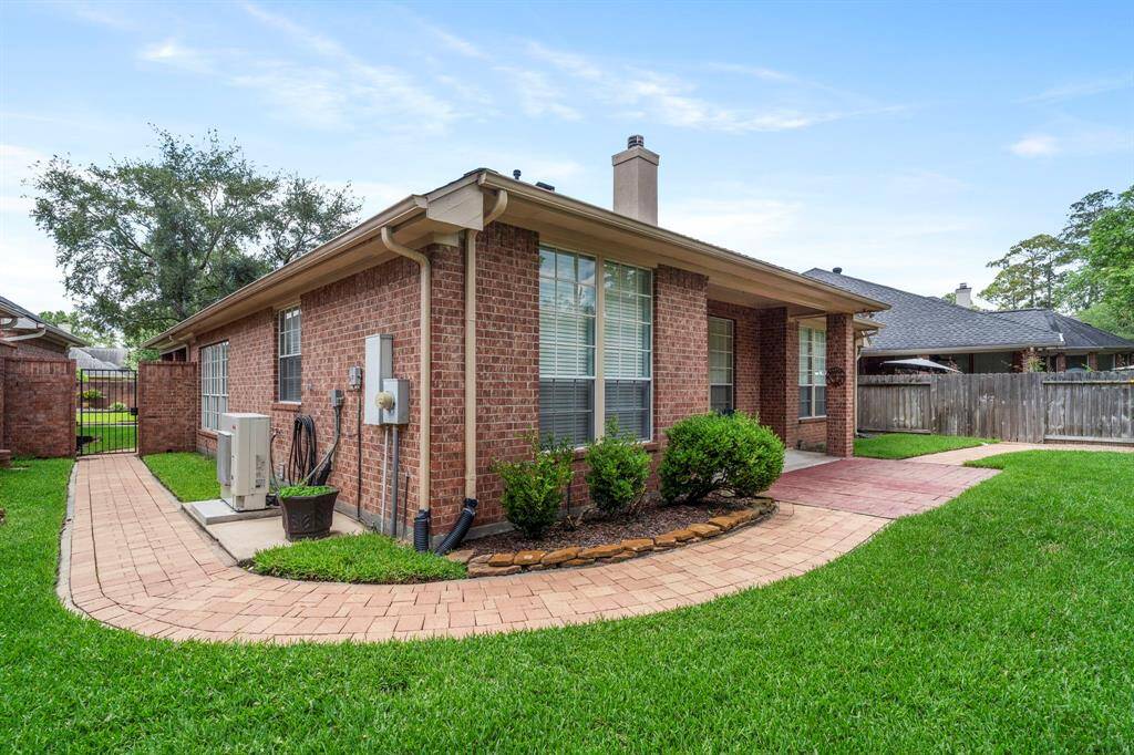 The paved walkway leads to the front of the home!